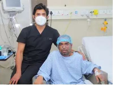 Dr. Attawar with the patient