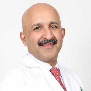 Dr. Havind Tandon